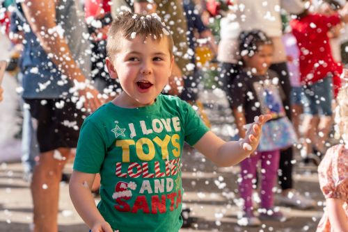 Young boy enjoys the snow at Light Up Windsor