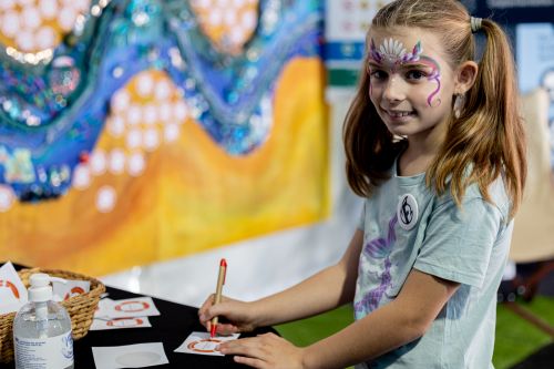 A young visitor taking the river safety pledge in 2024