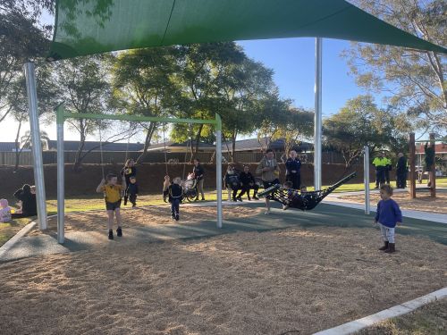 Picture of children playing at the Ivy Avenue playground opening,