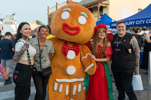 Guests pose with Gingerbread Man at Light Up Windsor